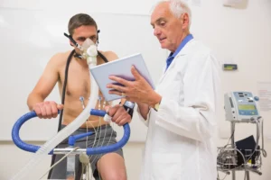 doctor showing tablet pc man doing fitness test